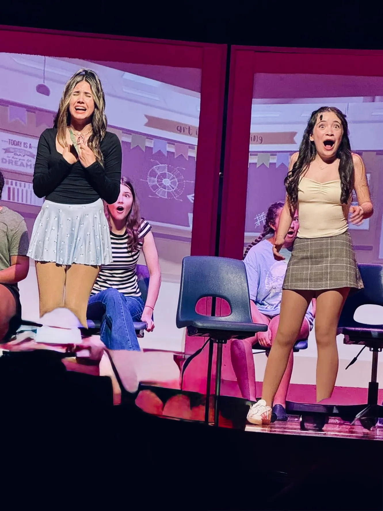 LyriCo musical theatre students performing a scene from Mean Girls on stage